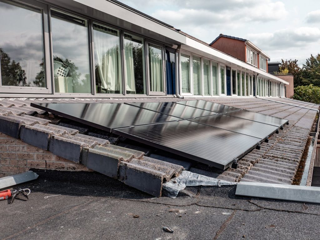 Crafting Captivating Headlines: Your awesome post title goes here Rooftop solar panels on a modern house, optimizing energy efficiency.